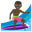 man surfing dark skin tone