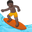 person surfing dark skin tone