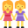 two women holding hands