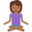 woman in lotus position medium-dark skin tone